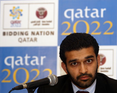 Hassan_Al-Thawadi_in_front_of_Qatar_logo