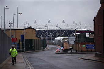 Olympic_Stadium_behind_buildings_January_25_2011