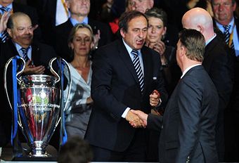 Michel_Platini_with_Champions_League_trophy_May_2010