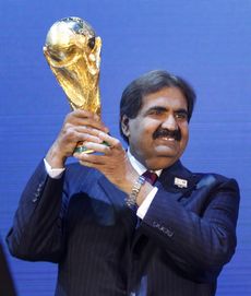 Emir_of_Qatar_with_World_Cup_December_2_2010