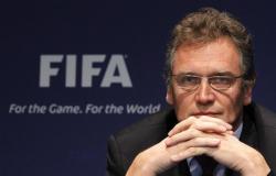 Jerome_Valcke_in_front_of_FIFA_logo