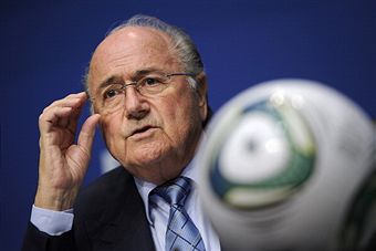 Sepp_Blatter_playing_with_glasses_Zurich_May_9_2011
