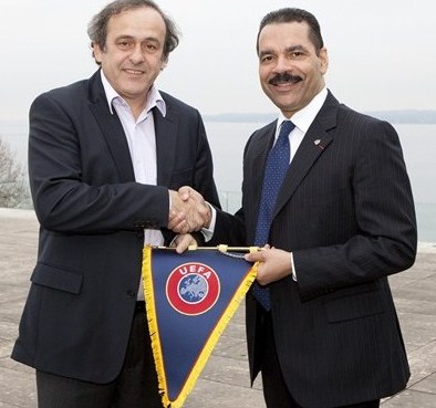 Michel Platini_with_Ron_Noble_January_2012