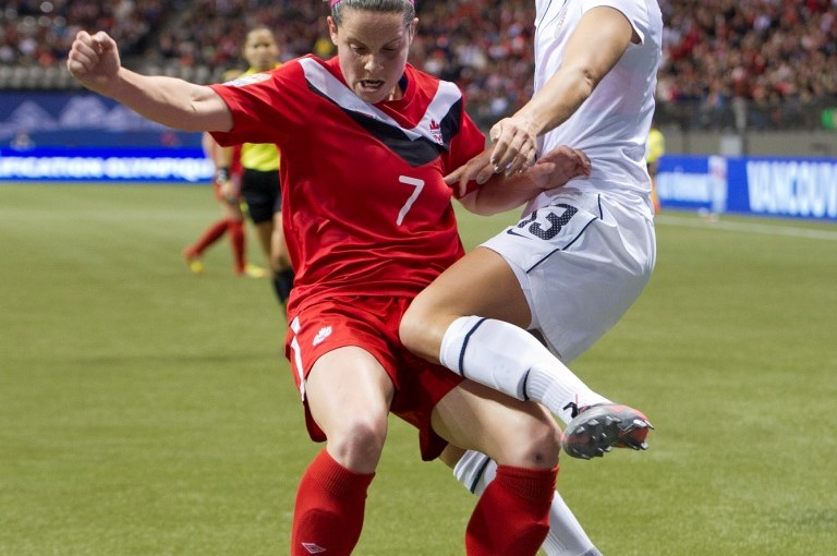 Rhian Wilkinson_of_Canada_and_Alex_Morgan_us_30-01-12