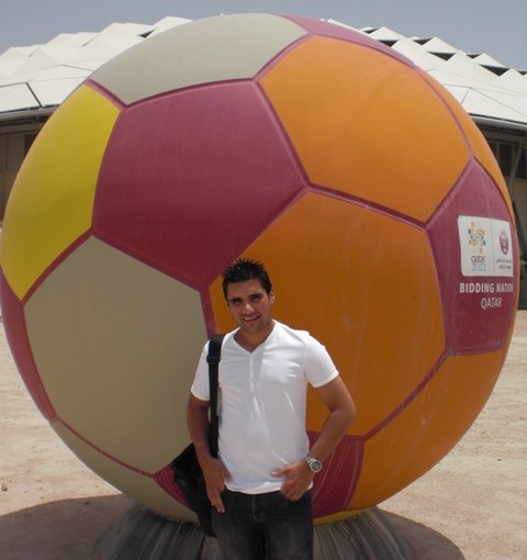 Tom Degun_in_front_of_ball_Doha_May_2011