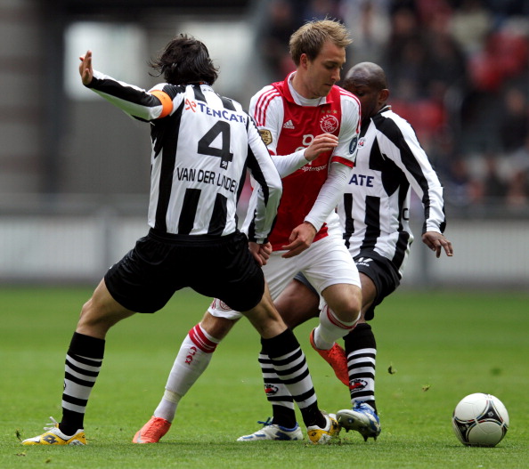 Christian Eriksen_of_Ajax_against_Antoine_van_der_Linden__Kwame_Quansah_of_Heracles