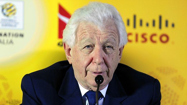 Frank Lowy_behind_microphone