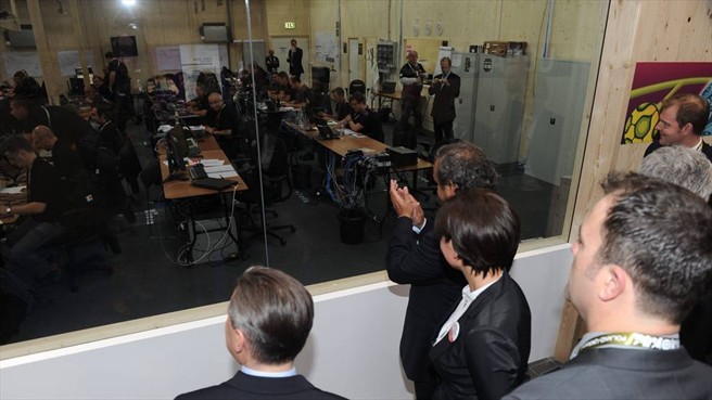 UEFA President_Michel_Platini_applauds_as_he_attends_the_IBC_opening_07-06-12
