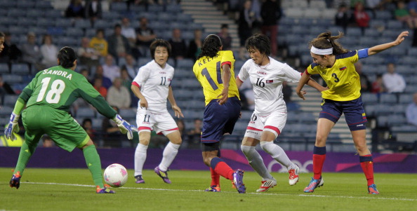 North Koreas_Kim_Song_Hui_scores_her_teams_first_goal_against_Colombia