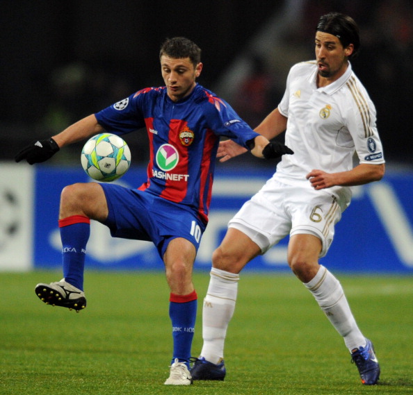 Sami Khedira_R_of_Real_Madrid_fights_for_the_ball_against_Alan_Dzagoev_L_of_CSKA_Moscow_06-07-12