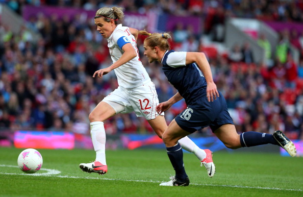 Christine Sinclair_of_Canada__Rachel_Buehler_of_USA