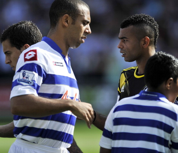 Queens Park_Rangers_English_defender_Anton_Ferdinand_avoids_shaking_hands_with_Chelseas_defender_Ashley_Cole