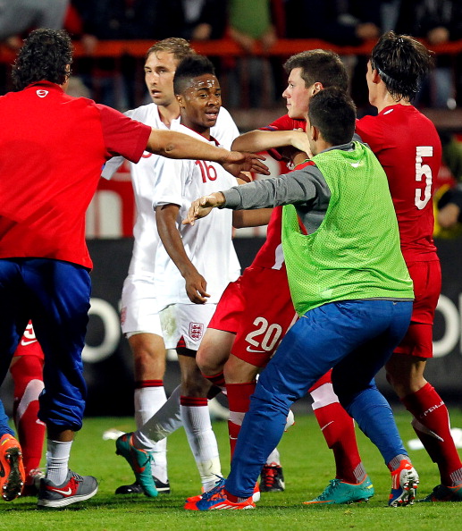 Raheem Sterling_of_England_under-21__Nikola_Ninkovic_of_Serbia_under-21