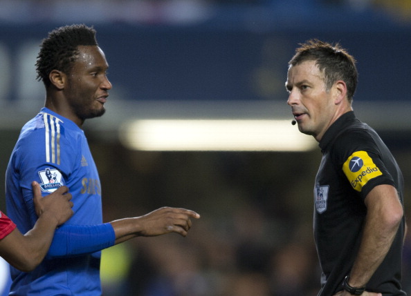 John Mikel_Obi_2nd_R_talking_with_referee_Mark_Clattenburg_16-11-12