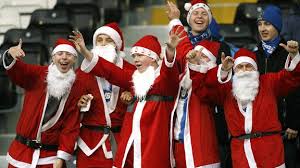 Santas go to the match