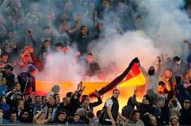 Zenit fans burn Dortmund flag
