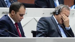 Michel Platini right beside Prince Ali