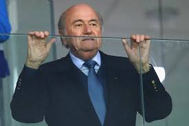 Blatter looking on