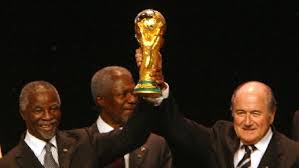 Kofi Annan with World Cup and old friend