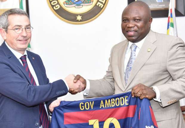 lagos-governor-akinwunmi-ambode-with-barcelona-representative ykb3t42g7ntu1wqp51vxet3oh