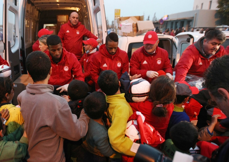 Olympiacos hand out aid