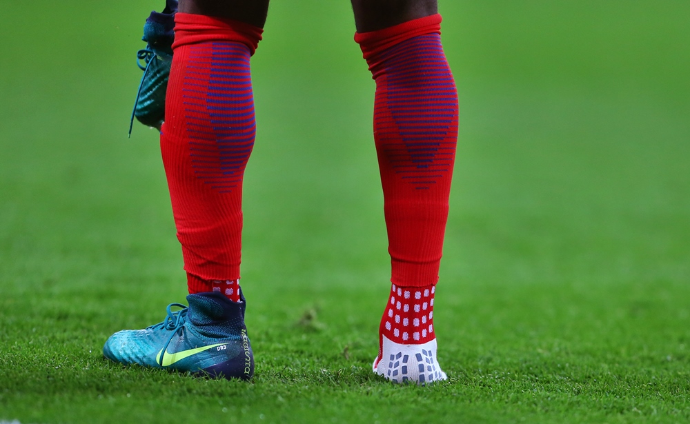 Socked. Down and out England fined by FIFA for wearing wrong ankle ...
